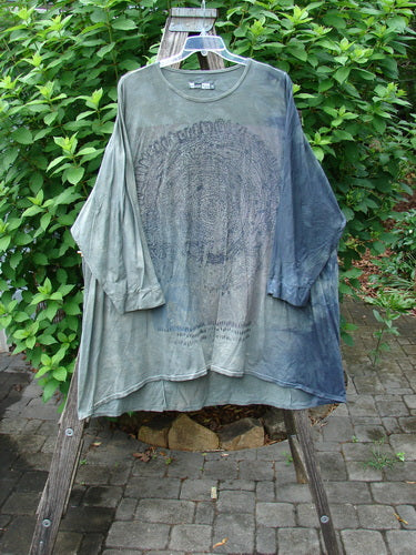 Barclay Art Tee Tree Life Ring Mottled Army Black OSFA displayed on a rack, showcasing its tunic length, drop shoulders, three-quarter sleeves, rounded neckline, and unique hemline.