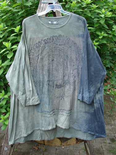 Barclay Art Tee Tree Life Ring Mottled Army Black OSFA on a hanger, showcasing its loose three-quarter sleeves, varying hemline, and generous tunic length, reflecting BlueFishFinder's creative vintage style.