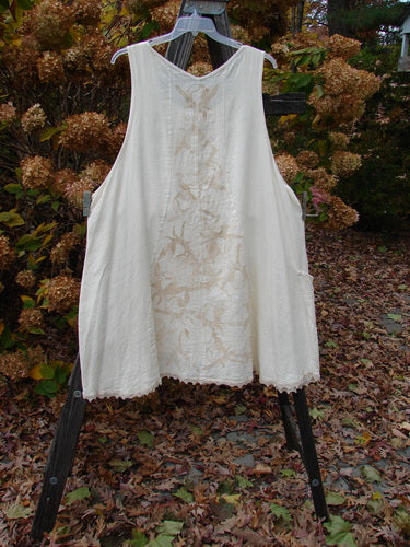 Barclay Linen Figure 8 Lace Hem Pocket Pinafore Dress with unique curvy seams, floral accents, and drop side wrap pockets.