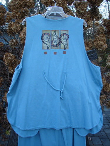 Image alt text: "1997 Elements Dock Straight Duo Shells Atlantis Size 2 blue apron with a design on it, part of the Spring Collection, made from Medium Weight Organic Cotton"