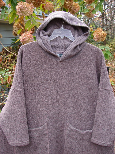 Barclay Fleece Hooded Square Pocket Pullover in Unpainted Variegated Stone OSFA displayed on a hanger, highlighting its heavyweight organic cotton and recycled polyester blend, ideal for expressing individuality through vintage style.