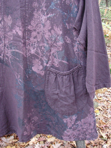 Close-up of the Barclay Woven Figure 8 Pocket Tunic Dress Bouquet in Deep Wine, showcasing the intricate woven pattern and detailed pocket design, reflecting BlueFishFinder.com's vintage-inspired, expressive style.