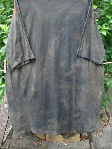 Barclay Tournesol Tunic Daisy Crane Metallic Bark OSFA features a tunic length, drop shoulders, and loose three-quarter sleeves with a unique varying hemline, showcasing artistic design and organic fabric.