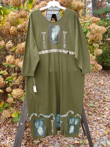 1993 NWT Holiday Button Maker's Dress: Roman Goddess design on a green dress with vintage buttons around the waistline.