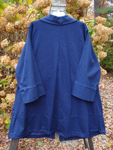 A triangular collar coat with unique panels and banded sleeves, part of the Barclay Denim Collection in Royal, size 2.