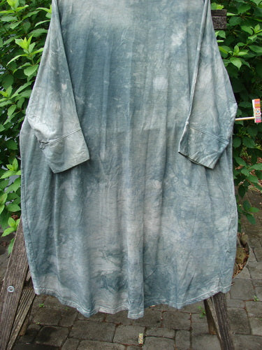 Barclay Bamboo Dolman Day Jacket in Mottled Field Grass, featuring an open front, dolman long sleeves, cuffed lower sleeves, two drop front pockets, and a floral theme rear, showcasing Bluefishfinder's vintage elegance.