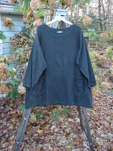 Barclay Woven Summercloth Figure 8 Pocket Tunic Dress Unpainted Forest Size 2 displayed on a hanger, showcasing its long sleeves and heavy-weight fabric, reflecting Bluefishfinder.com's vintage and expressive style.