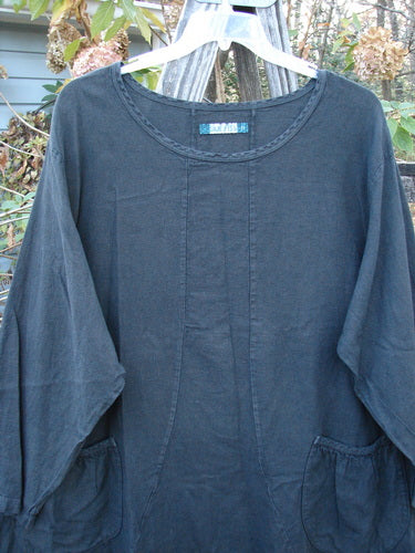 Barclay Woven Summercloth Figure 8 Pocket Tunic Dress Unpainted Forest Size 2, displayed on a rack, featuring long sleeves and a distinctive design, representative of Bluefishfinder.com's vintage Blue Fish Clothing collection.