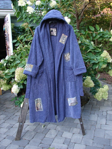 1995 Patched Hooded Chenille Spa Robe Study Mediterranean Size 3 displayed on a stand, featuring a double-layered hood, cuffed sleeves with patches, oversized front pockets, and a rear neckline tab.