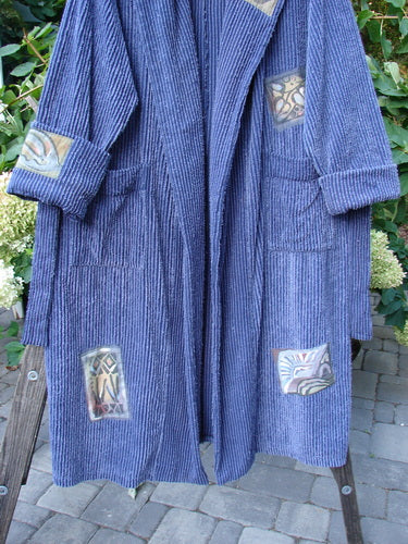 1995 Patched Hooded Chenille Spa Robe Study Mediterranean Size 3 features a blue robe with patches, double-layered hood, cuffed sleeves, oversized pockets, and intricate design, embodying vintage luxury and unique style from Bluefishfinder.com.