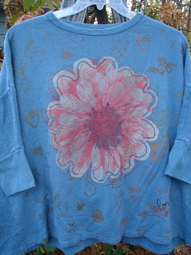 Barclay Hemp Cotton Banded Sleeve Dolman Top Mum Blue Dusk OSFA featuring a vibrant flower design on the front, highlighting Bluefishfinder.com's vintage-inspired, expressive fashion ethos.