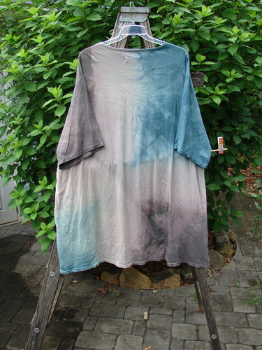 Barclay Art Tee Fern Garden Mottled Pure Dawn OSFA displayed on a swinger, featuring a tunic length, drop shoulders, and loose three-quarter sleeves with a rounded neckline and varying hemline.