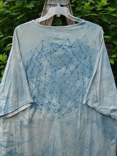 Barclay Art Tee Rosemary Sprig Mottled Day Sky OSFA, featuring a tunic length, drop shoulders, loose three-quarter sleeves, rounded neckline, and distinctive rosemary sprig design on organic cotton.