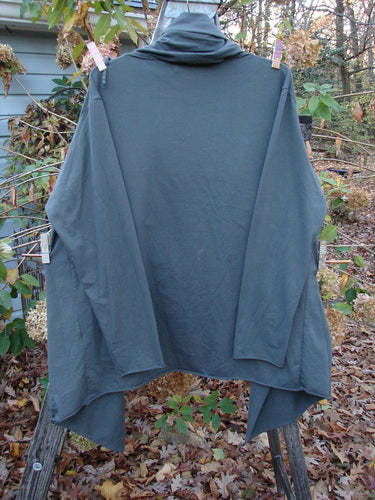 Barclay Cotton Lycra Gather Collar Open Front Jacket in size 2 hanging on a clothesline, showcasing its medium weight and pocketed design, embodying Bluefishfinder.com's vintage and creative clothing essence.