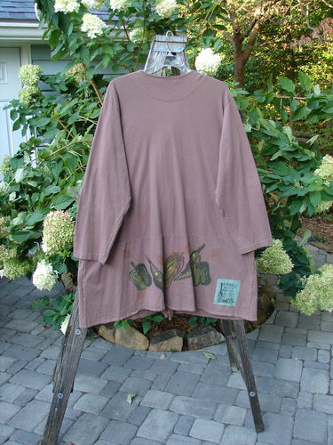 1998 Harvest Jacket Veggie Garden Eggplant Size 2 on a hanger, featuring oversized pockets with vine paint, porcelain garden buttons, a V neckline, and an A-line shape.