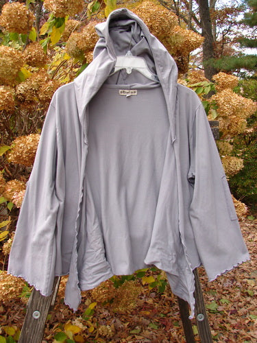 Barclay Patched Cotton Lycra Hooded Shrug Jacket, lilac, size 2. A grey jacket with a hood on a swinger.