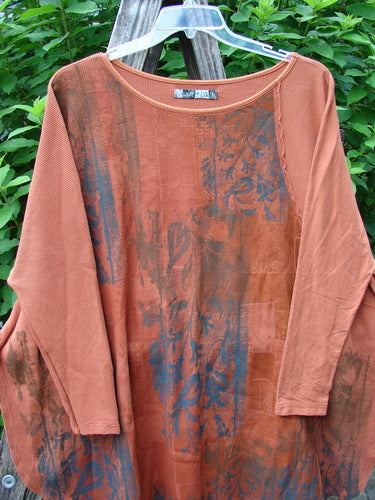 Barclay Thermal Monte Verde Vented Tunic on display, showcasing a rounded neckline, widening shape, side vents, and slim fitted sleeves with contrasting stitchery, embodying Bluefishfinder.com's vintage-inspired, creative fashion ethos.