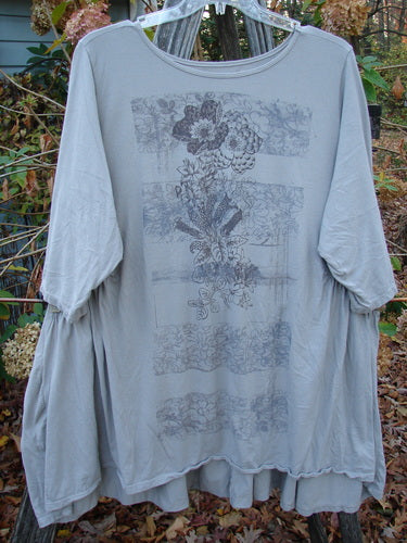 Barclay Three Quarter Sleeve Side Gather Sweep Tunic Bouquet Natural Size 2, featuring a lightweight, pocketless design with a floral pattern, emphasizing creativity and individuality through its unique aesthetic.