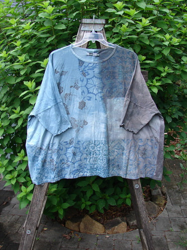 Barclay Dolman Curl Edge Square Pullover Victorian Mandela Mottled Sky Gray OSFA displayed on a hanger, showcasing its wide, boxy shape, drop shoulders, and seamless front and back design.
