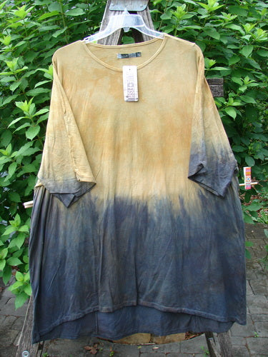 Barclay NWT Art Tee Unpainted Sun Field & Night OSFA displayed on a swinger, highlighting its tunic length, drop shoulders, three-quarter sleeves, rounded neckline, and varying hemline.