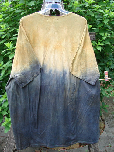 Barclay NWT Art Tee Unpainted Sun Field & Night OSFA features a tunic length with drop shoulders and three-quarter sleeves, showcasing a rounded neckline and varying hemline, ideal for individual expression.