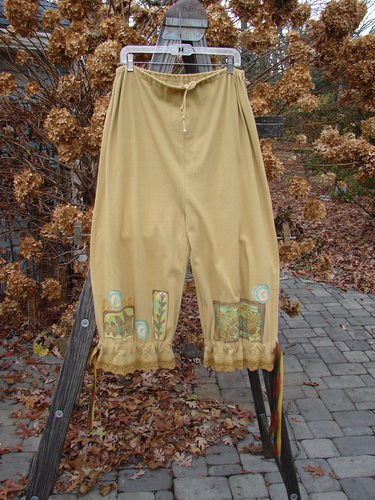 1992 Pantaloon Sea Turtle Camino OSFA: A pair of pants with a drawstring, made from medium weight cotton and antique lace. Wide swingy lowers with double paneled lower ribbon banding. Features a sea turtle theme paint and a blue fish signature patch.