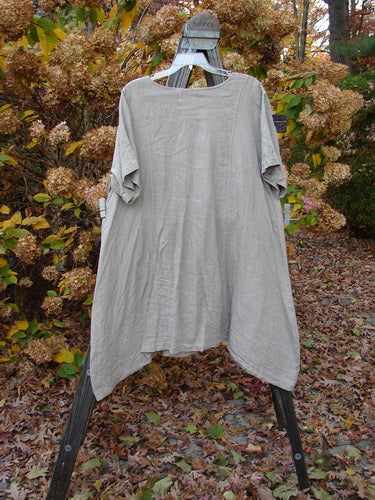 Barclay Linen Figure 8 Drop Pocket Tunic Dress on swinger with leaves and tool close-ups.