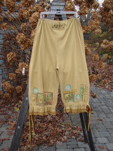 1992 Pantaloon Sea Turtle Camino OSFA: Pants with a sea turtle design hanging on a clothesline.