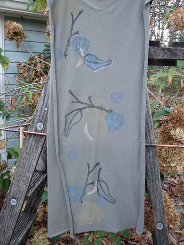 1994 Scarf Forest Leaf Raku One Size draped over a wooden ladder, showcasing intricate blue and grey designs, reflecting the vintage and creative spirit of Bluefishfinder.com.