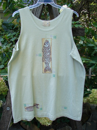 2000 Summer Tank Top Fish Dune Grass Size 2. White tank top featuring a fun fish theme paint, deeper arm openings, and a straighter, longer shape. Made from mid-weight organic cotton.