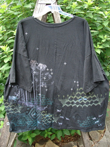 Barclay Center Seam Wide Line Tee Tree Moon Star Black OSFA features a unique tree and moon star design on a black canvas with a ribbed neckline, drop shoulders, and vertical seams.