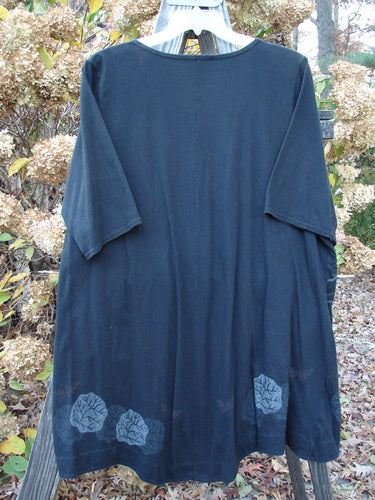 A long blue robe with leaf design, featuring a deep V banded waist and short sleeves.