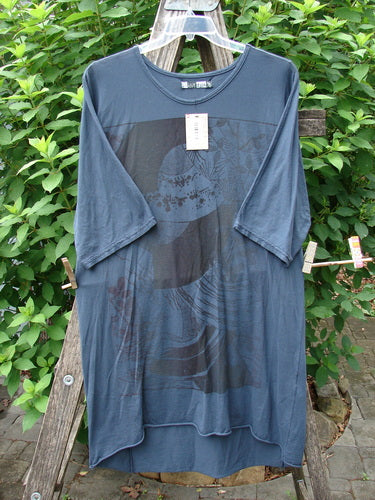 Barclay NWT Tournesol Slim Tunic Turn Moon Navy OSFA displayed on a wooden rack, showcasing its drop shoulders, loose three-quarter sleeves, and varying hemline, embodying Bluefishfinder.com's vintage-inspired creative style.