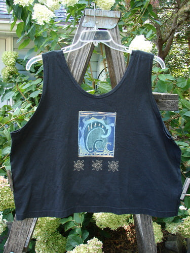 1997 Elements Crop Tank Wave Curl Ebony Size 2: A black tank top featuring a blue curl wave design with a contrasting fish patch, perfect for summer wear.