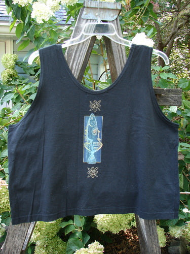 1997 Elements Crop Tank Wave Curl Ebony Size 2: Black tank top featuring a vibrant fish patch and wave curl theme, with a scooped neckline, wide hem, and deeper arm openings.