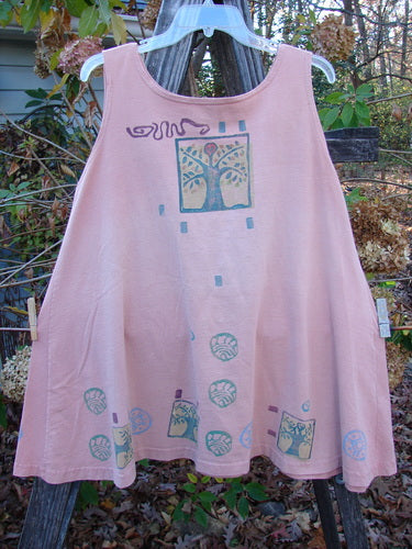 1991 Tab Dress Heart Tree Salmon Altered OSFA features a unique pink dress adorned with a tree pattern, embodying vintage Blue Fish Clothing's ethos of creative freedom and individuality.