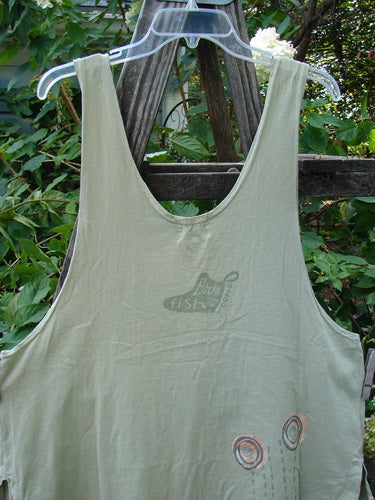 2001 Katy Vest Circle Rain Kelp Size 1 displayed on a mannequin, featuring lengthy thin shoulder straps, wider rounded A-line shape, swingy lower, and two front triangular pockets with Blue Fish button closures.