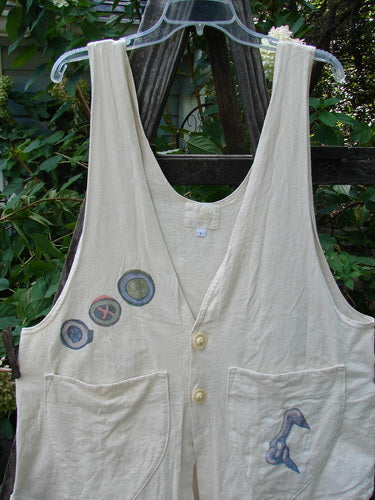 2001 Katy Vest Chain Rain Natural Size 1 from Blue Fish Clothing, featuring buttons, bird painting, triangular pockets, and varying hemline, made from organic cotton with unique chain rain theme paint.