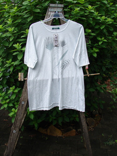 Barclay NWT Slub Simple A Line Tee Feather Dew Size 2 displayed outdoors on a wooden stand, featuring a rounded neckline, slight A-line flare, three-quarter sleeves, and curly edgings, epitomizing BlueFishFinder's vintage style.