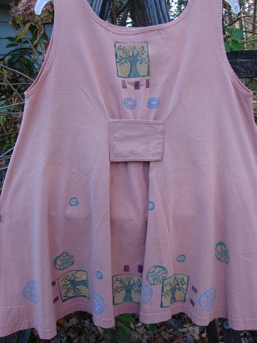 1991 Tab Dress Heart Tree Salmon Altered OSFA, featuring a unique design with a close-up view of a pocket, embodying the vintage and creative style of Blue Fish Clothing.