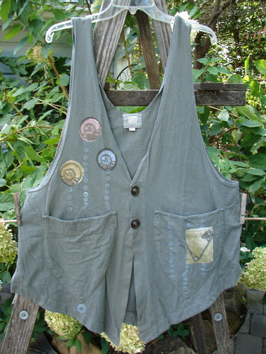 2001 Katy Vest Shell Rain Inkpod Size 1, featuring original Blue Fish button closures, two front triangular pockets, and a varying hemline. The vest showcases lengthy thin shoulder straps and a swingy weighted lower.