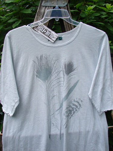 Barclay NWT Slub Simple A Line Tee Feather Dew Size 2 displayed on a hanger, featuring three-quarter length sleeves, a rounded neckline, and curly edgings, highlighting its lightweight, slubbed organic cotton fabric.