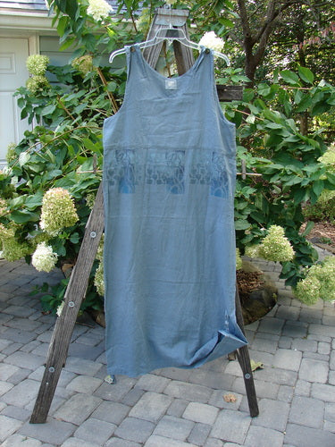 2000 Almost 7 Jumper Rock Wall Blue Mineral Size 1 displayed on a wooden ladder, showcasing button shoulders, a rounded neckline, and unique tabbed sides at the hem.