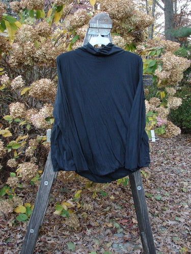 Barclay Batiste Rolled Paper Turtleneck Top, black shirt on wooden stand, draped neckline, double layered lightweight cotton. Size 2 ai.