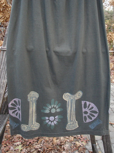 1993 Drawcord Skirt Column Black Sand Size 2: A grey skirt with a painted design featuring a continuous column theme. Full elastic and rope waistline with a slight bottom flare.