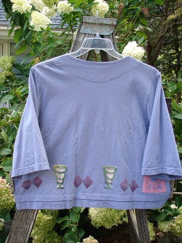 1999 Tuck Top Diamond Life Iris Size 2, featuring wine glasses print, crop box shape, pastel buttons, and signature Blue Fish patch, perfect for spring.