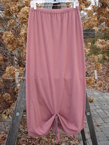1994 Gather Skirt Unpainted Gourd Size 1: A pink cotton jersey skirt with replaced elastic waistband and sectional panels. Can be worn gathered front or back.