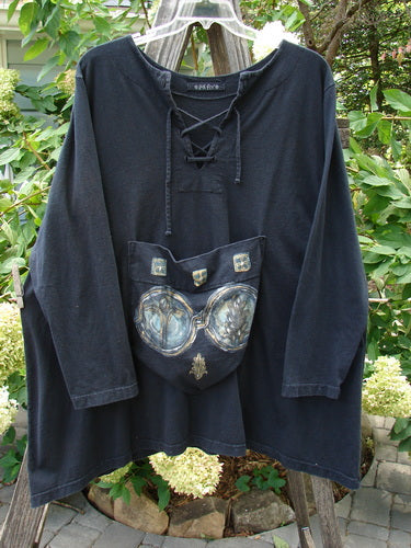 1998 Pocket Top Lace Up Celtic Infinity Black Size 1, featuring an A-line shape, varying hemline, extra-long laced neckline, and oversized painted pocket with Celtic design.