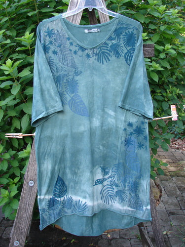 Barclay Tournesol Slim Tunic Beach Palm Mottled Green Earth OSFA featuring a beach palm pattern, loose three-quarter sleeves, and a longer back hem, ideal for expressing individual style.