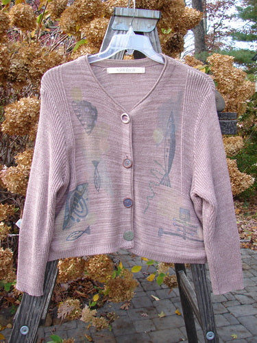 1995 Crop Cardigan Sweater with fish and space theme paint, in Twilight Rose Mélange. Hand-sewn label. Lovely blend of cotton and rayon. Original ceramic buttons. Variegated yarns in texture and stitchery. Rolled neckline, super long cozy sleeves.
